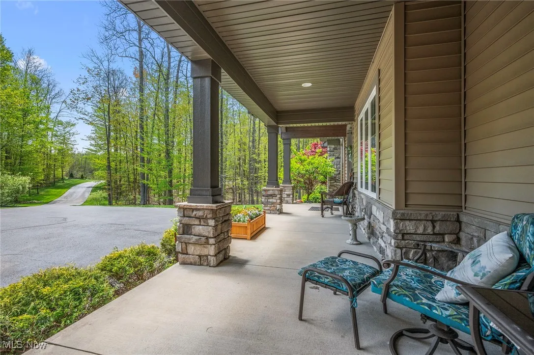 View of patio with a porch