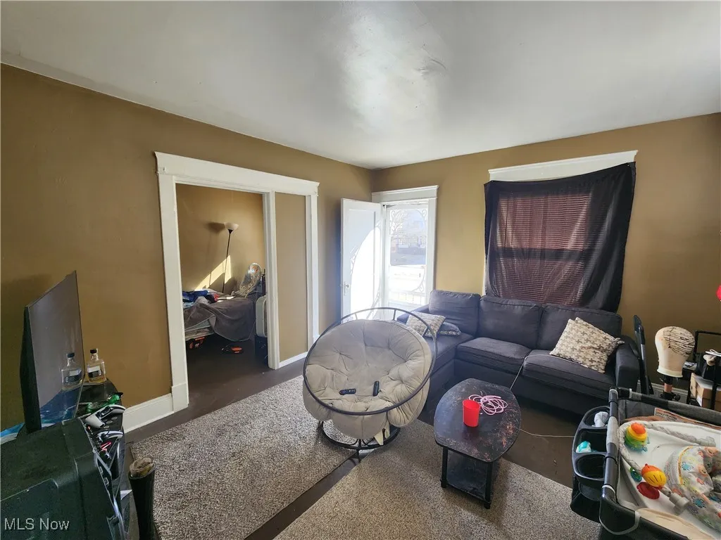 Living area featuring baseboards