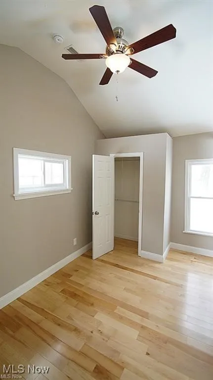 Guest Suite Bedroom with High-Ceiling and Ceiling fan