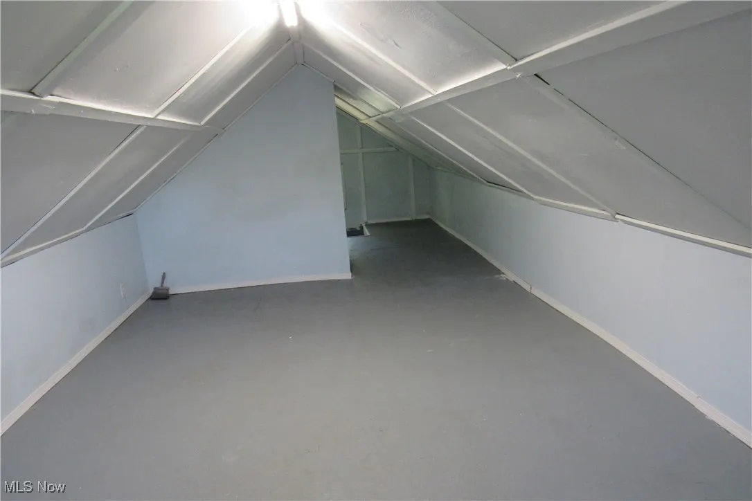 Bonus room featuring vaulted ceiling