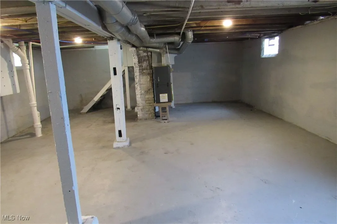 Below grade area with heating unit