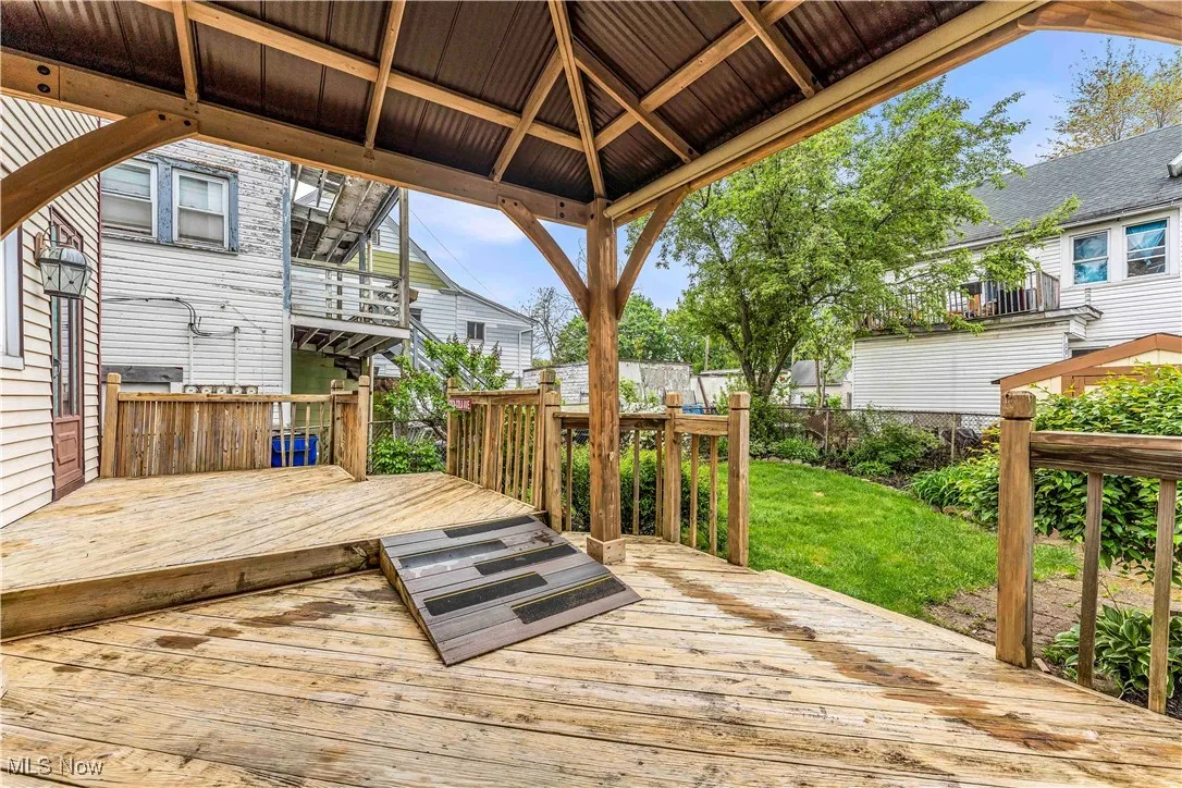 Wooden terrace with a yard
