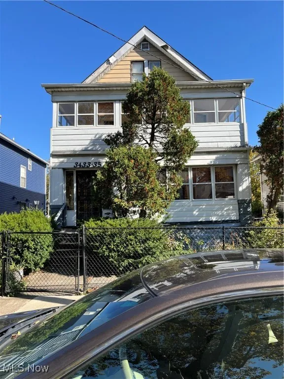 View of front of house with fence