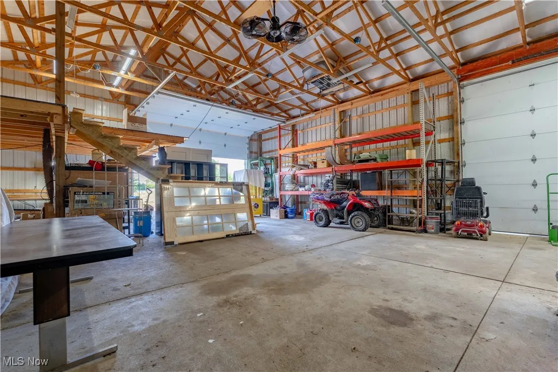Garage featuring metal wall