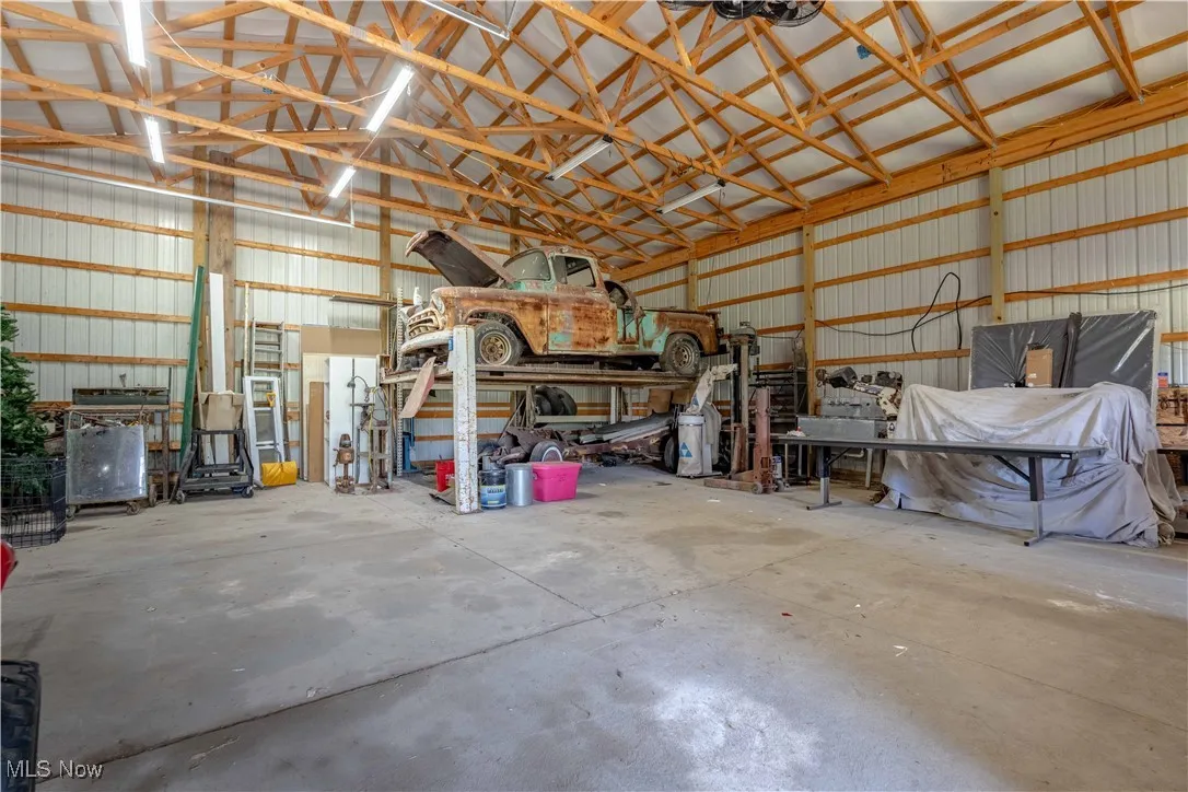 Garage featuring metal wall