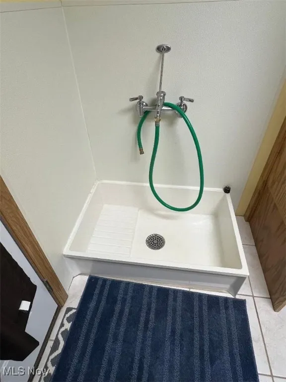 Bathtime is easy with this 1st-floor wash station for your family pets!