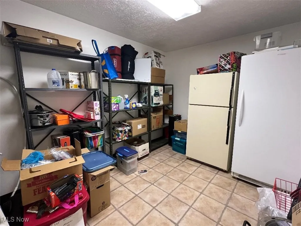 Currently used for storage, this finished room could easily be utilized for whatever suits your lifestyle!