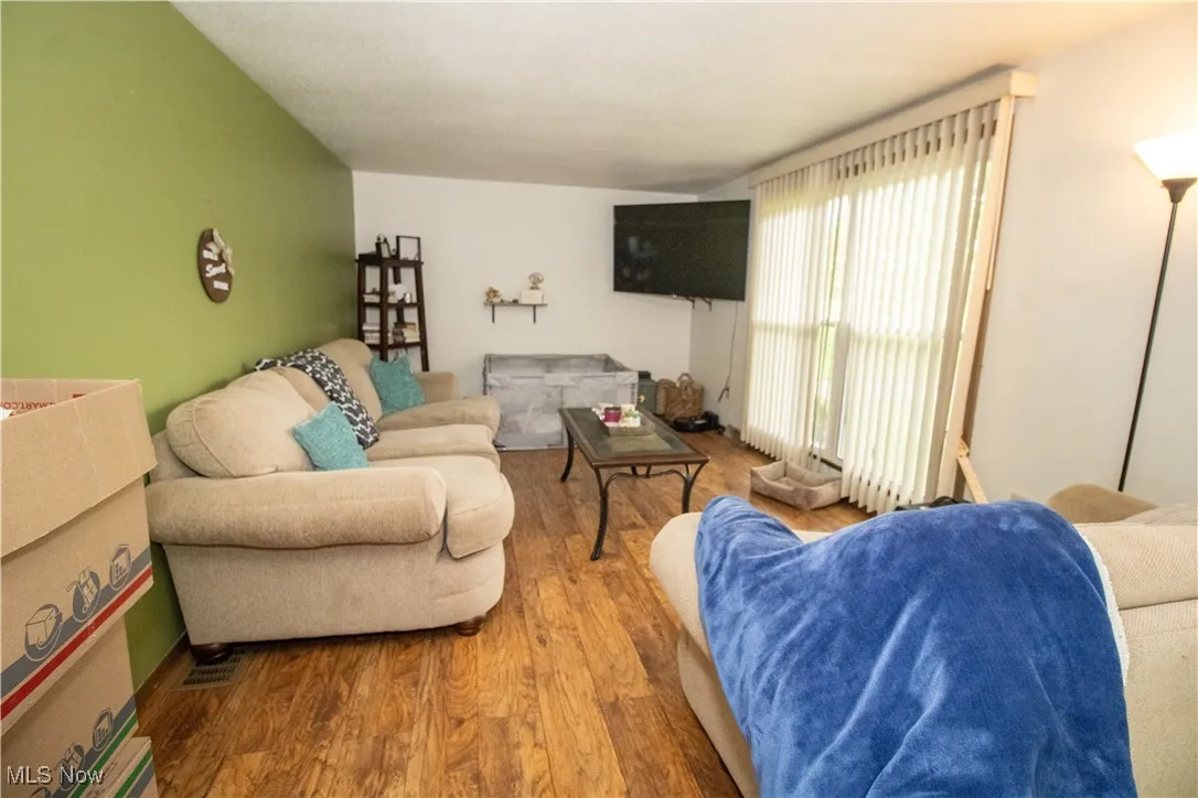 Living area with wood finished floors