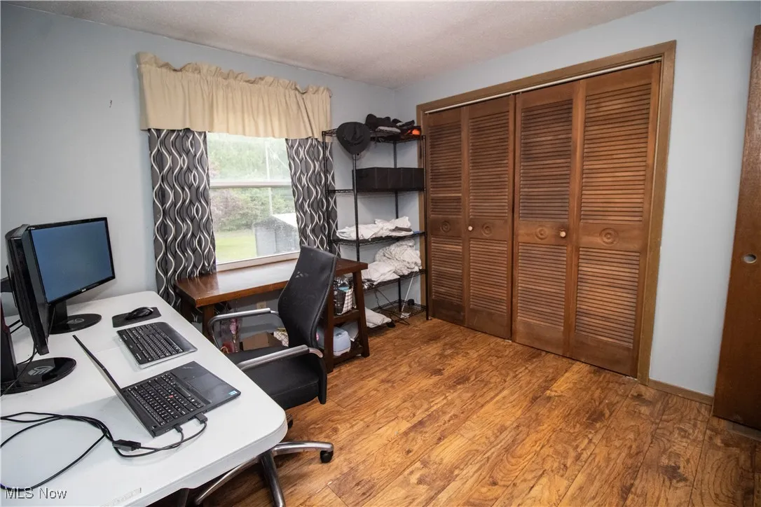Bedroom space featuring wood finished floors
