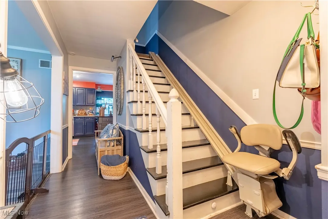 Staircase with wood finished floors