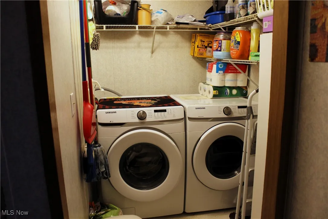 Laundry room featuring washing machine and dryer