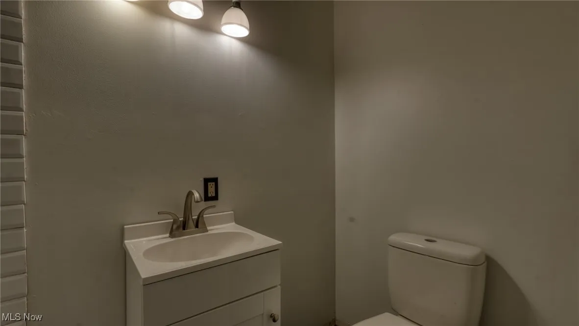 Bathroom featuring toilet and vanity