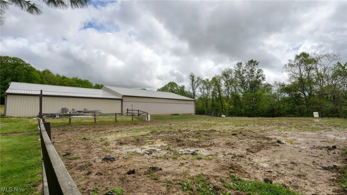 View of yard with an outbuilding and an outdoor structure