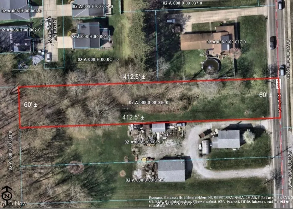 Aerial overview of property's location featuring property parcel outlined