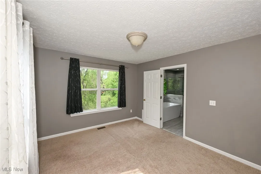 room off of master bath can be used for office