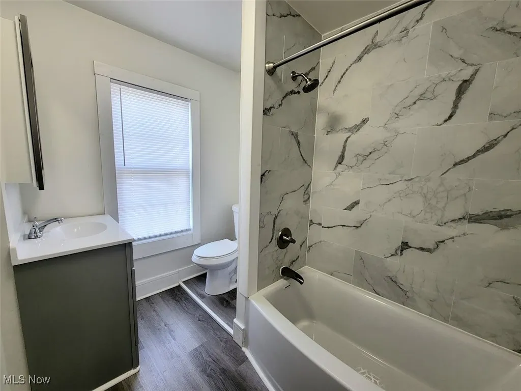 Updated full bathroom with tub/shower combo on the second floor.