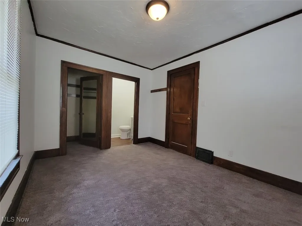 First floor bedroom with carpet.