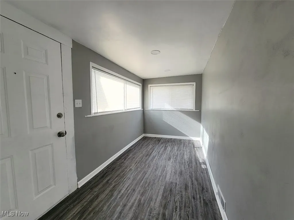 Mud Room or Bonus Room at the back of the home. You can enter this room from the back door. Vinyl flooring.