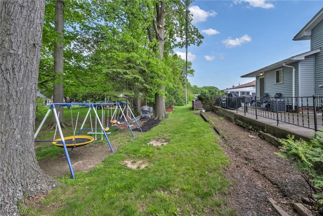 View of yard with a playground