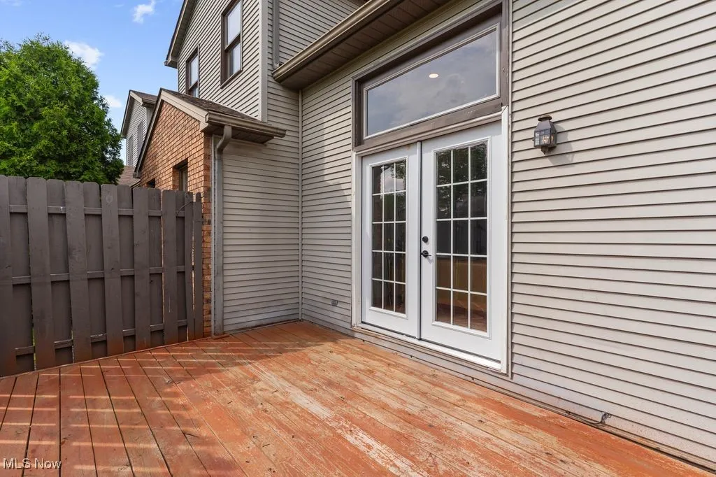 Deck with french doors and fence