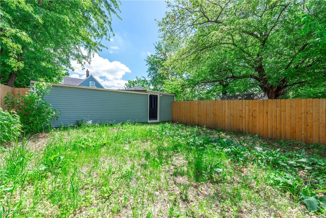 View of fenced backyard