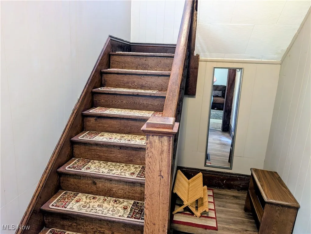 Stairway with wood finished floors