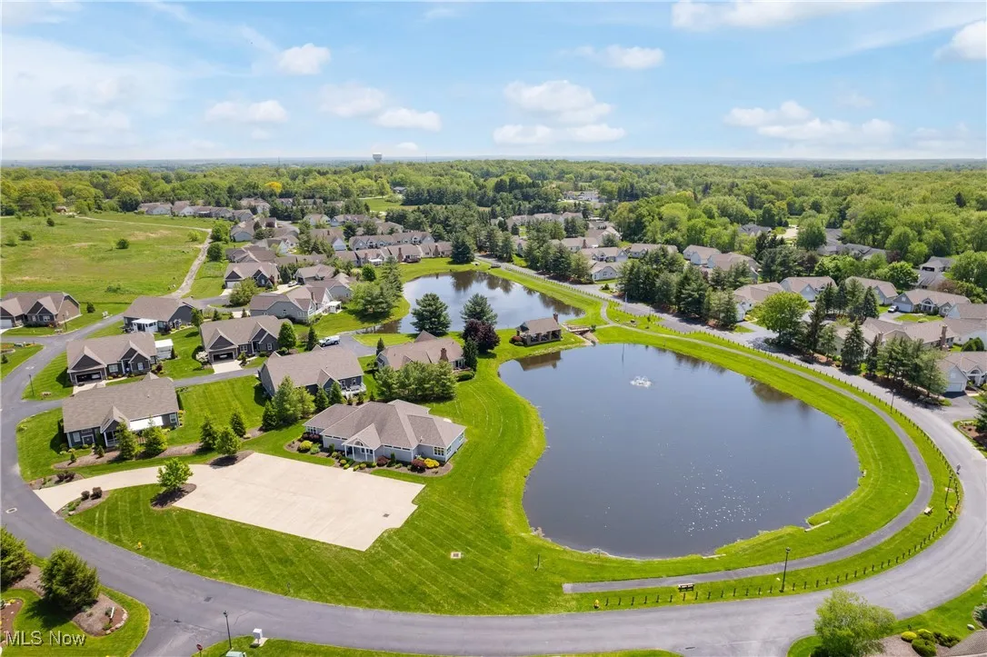 Aerial view of residential area with a large body of water