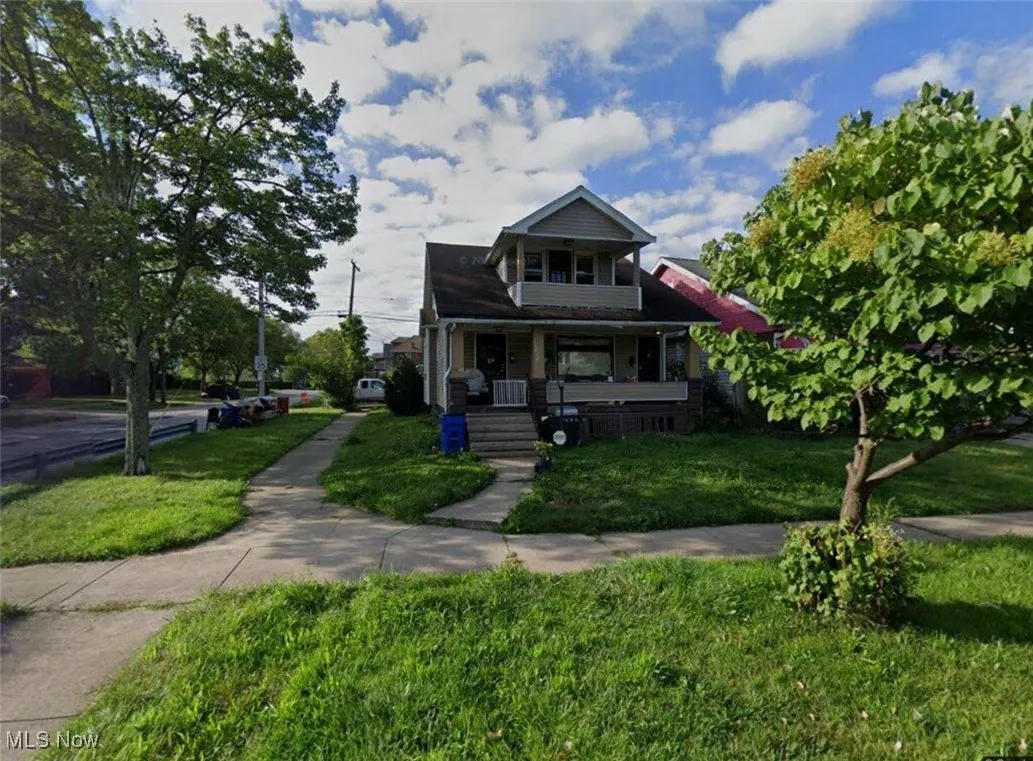 Bungalow-style house featuring covered porch and a front yard