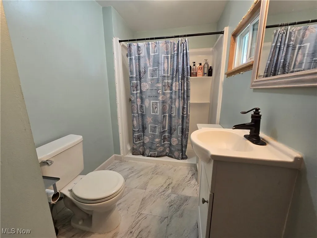 Full bath with walk-in Shower