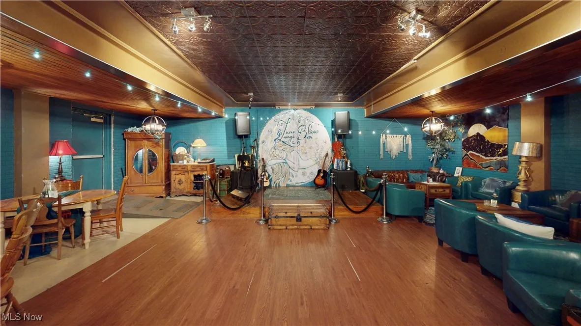 Miscellaneous room featuring hardwood / wood-style floors