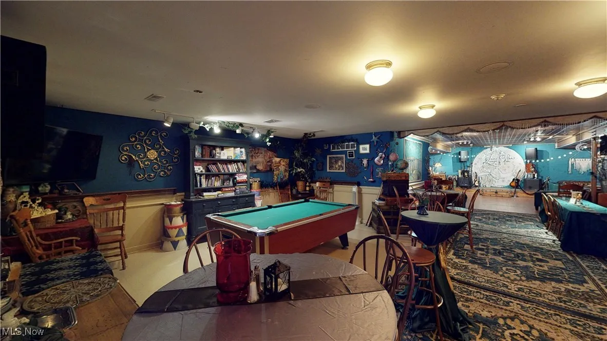 Rec room featuring billiards and bar area