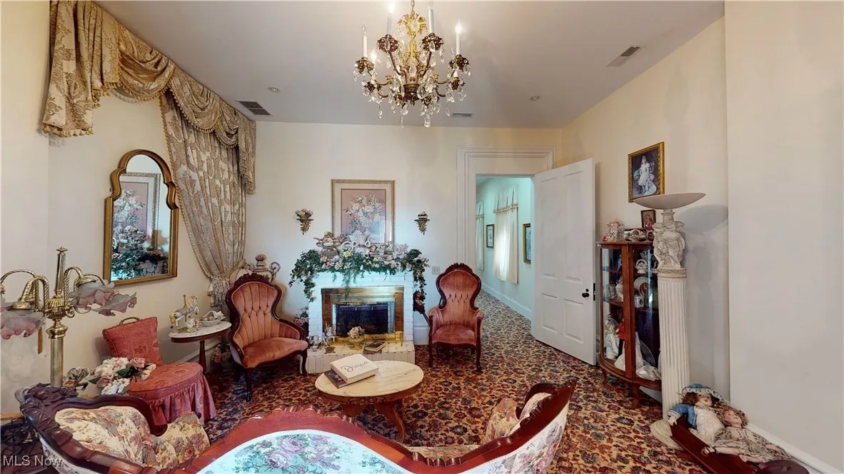 Sitting room featuring a chandelier