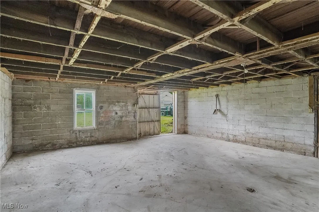 Below grade area with concrete block wall