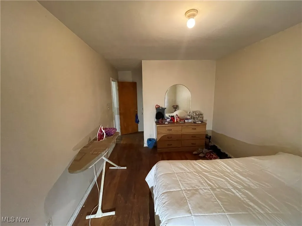 Bedroom featuring wood finished floors