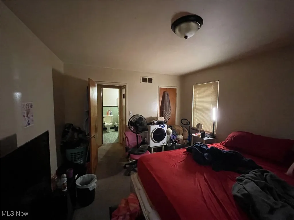 Bedroom featuring carpet flooring