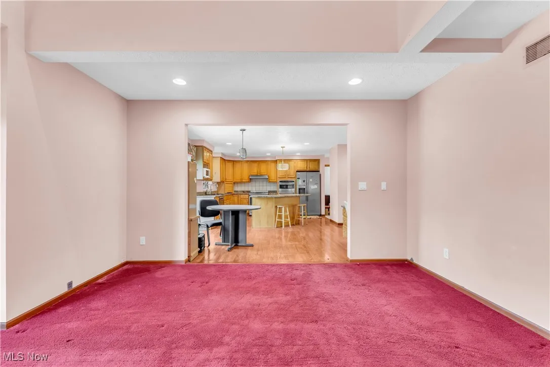 Great Room with 18 ft ceiling lets in natural light to cheer you up everyday