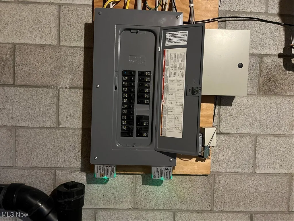 Utility room featuring electric panel