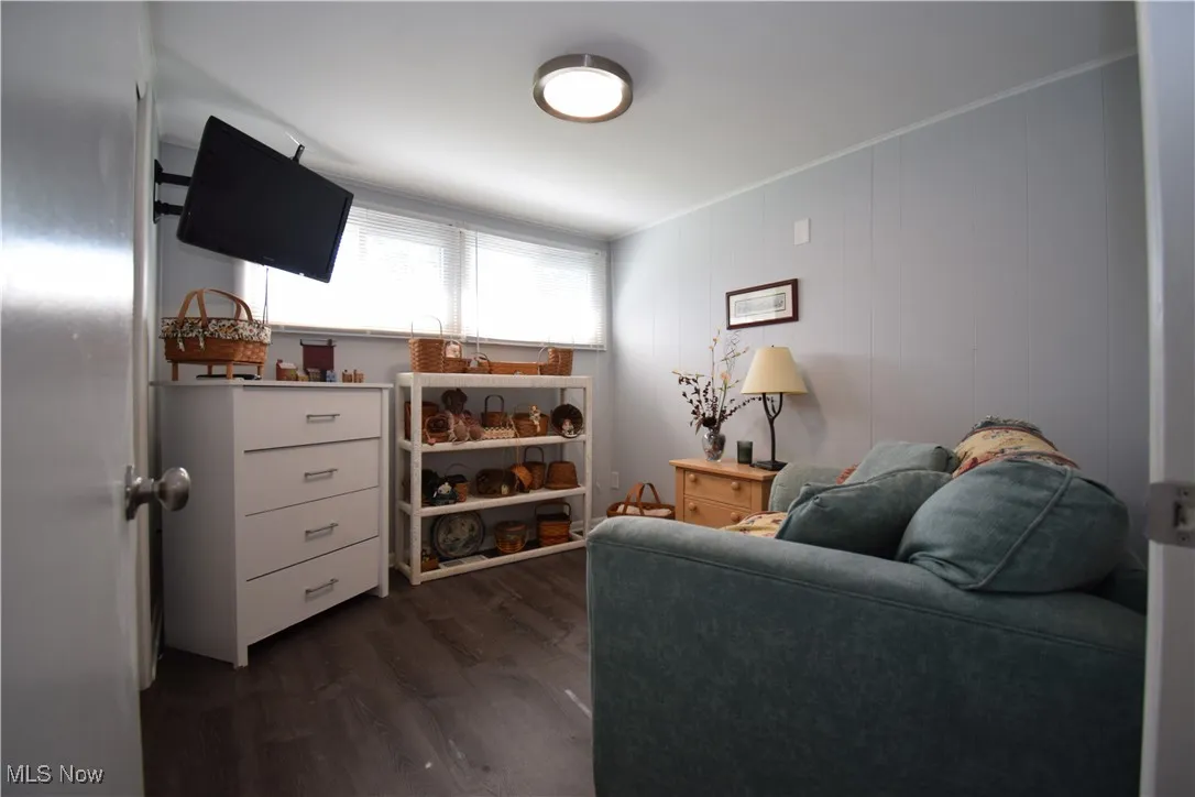 Living room featuring dark wood finished floors