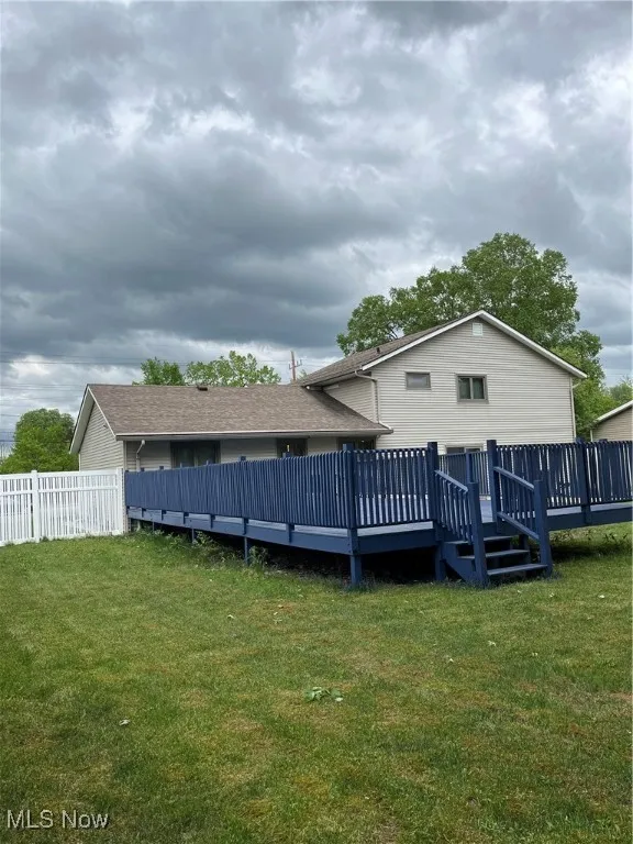View of yard with a deck