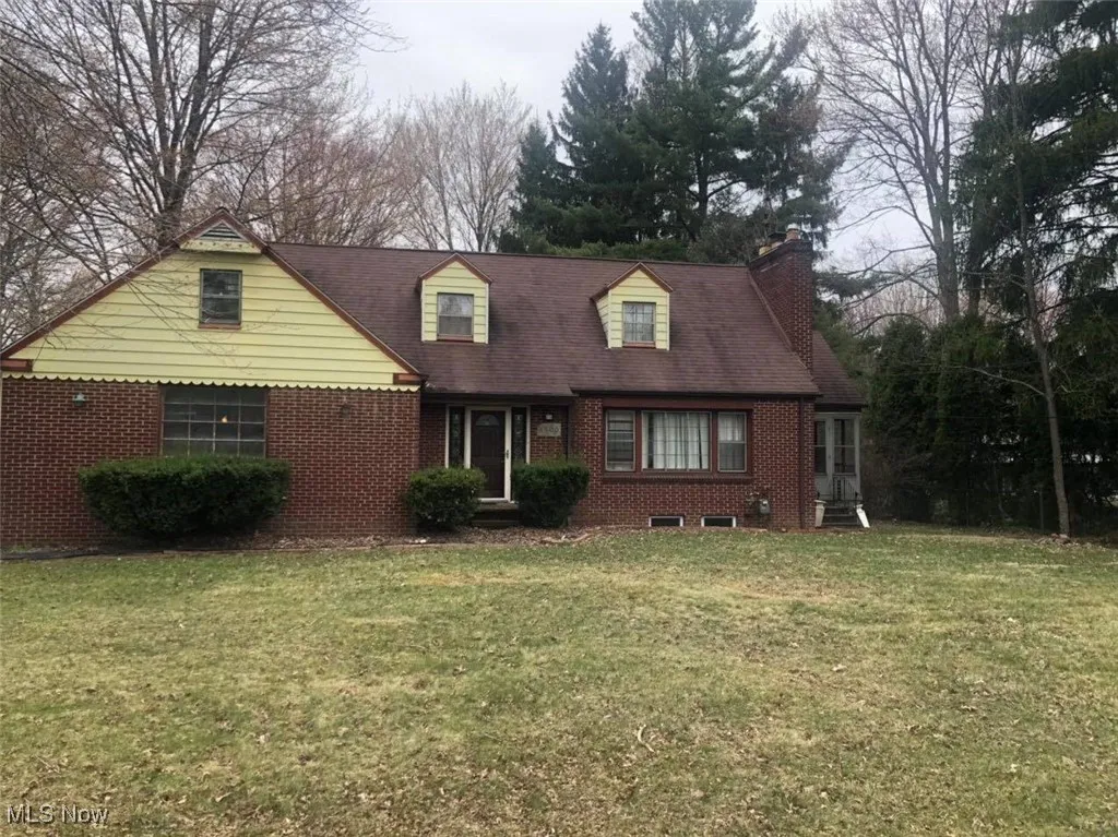 chimney, and a front yard