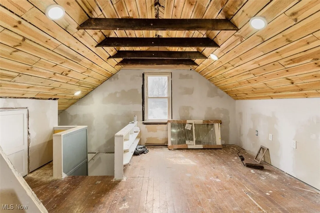 Bonus room with wood-type flooring, wood ceiling, and vaulted ceiling