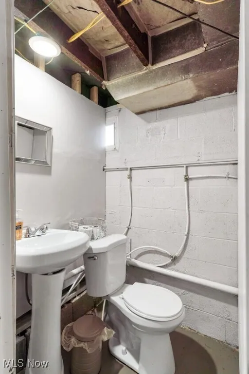 Bathroom featuring toilet and a shower