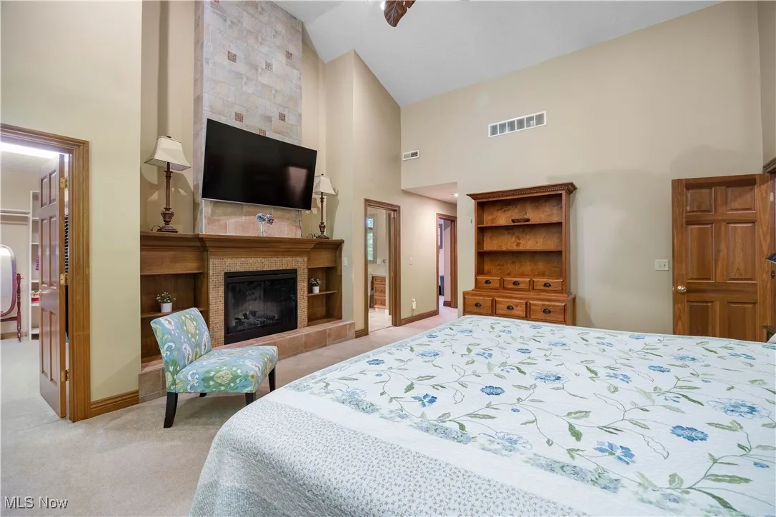 Master bedroom with vaulted ceilings