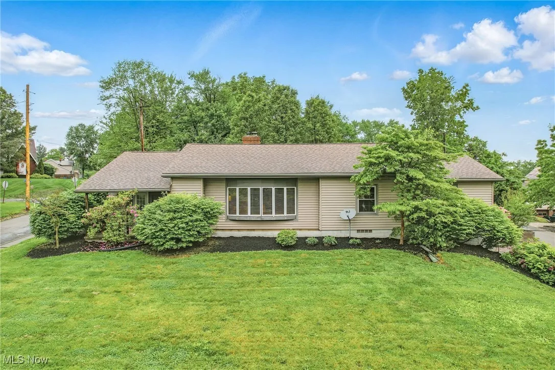 Back view of the home showing the large bay window.