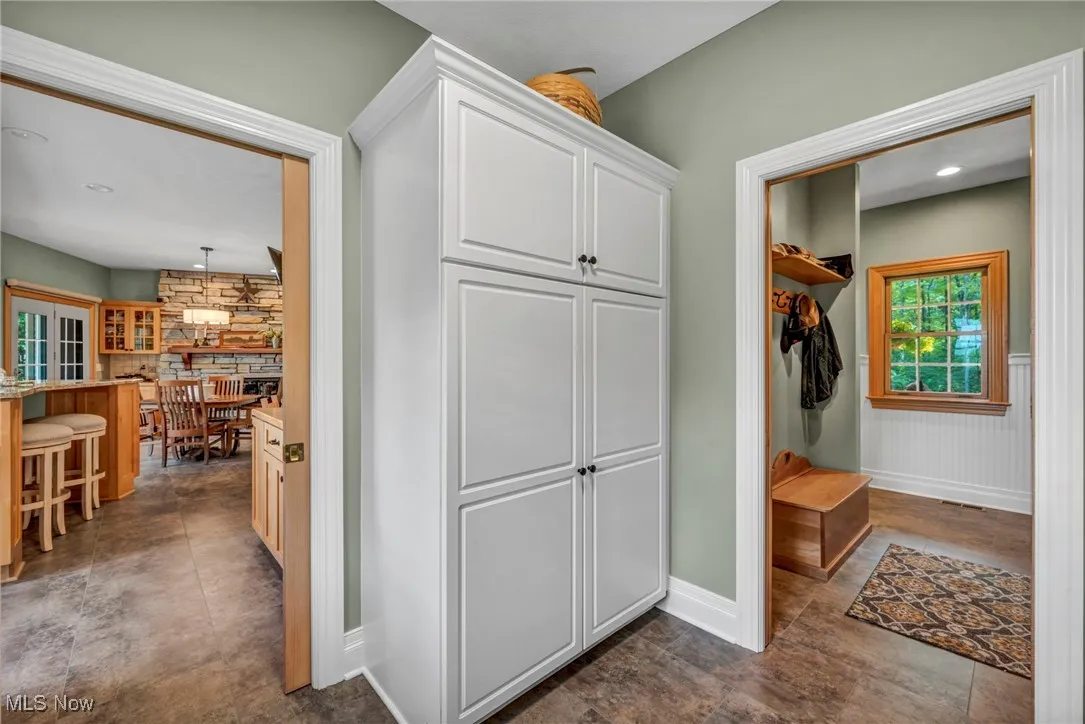 Mudroom featuring baseboards