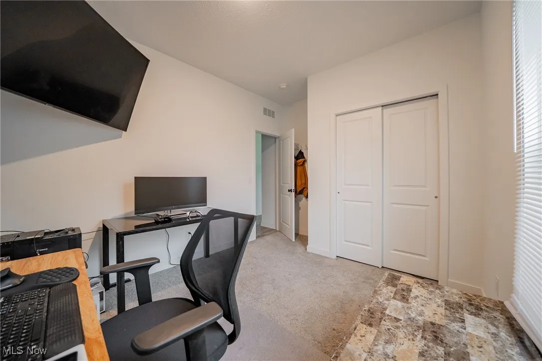Office space featuring carpet floors