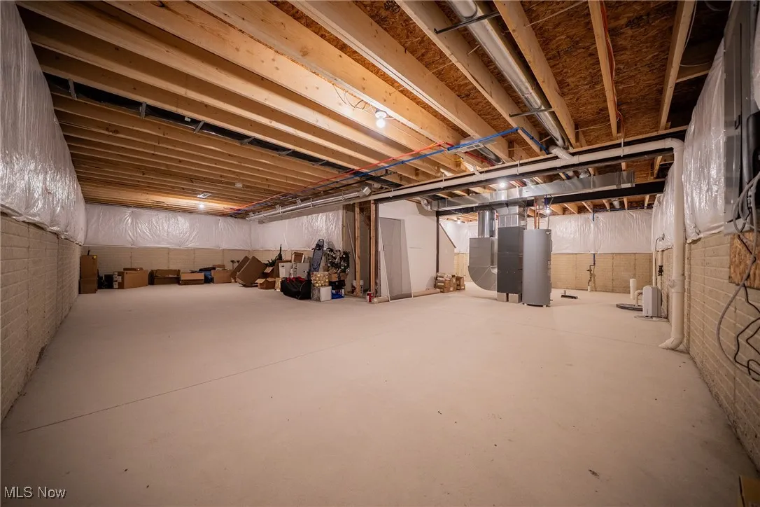 Unfinished basement with heating unit