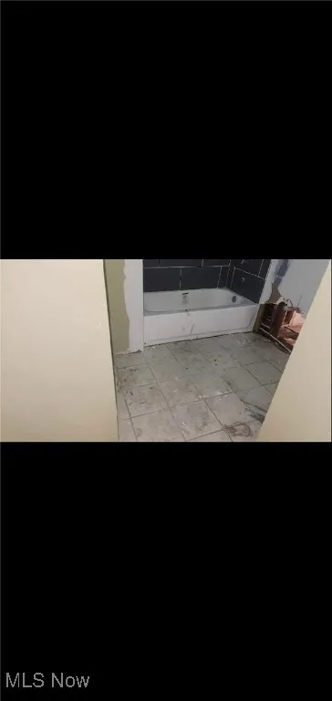 Full bath with a bath