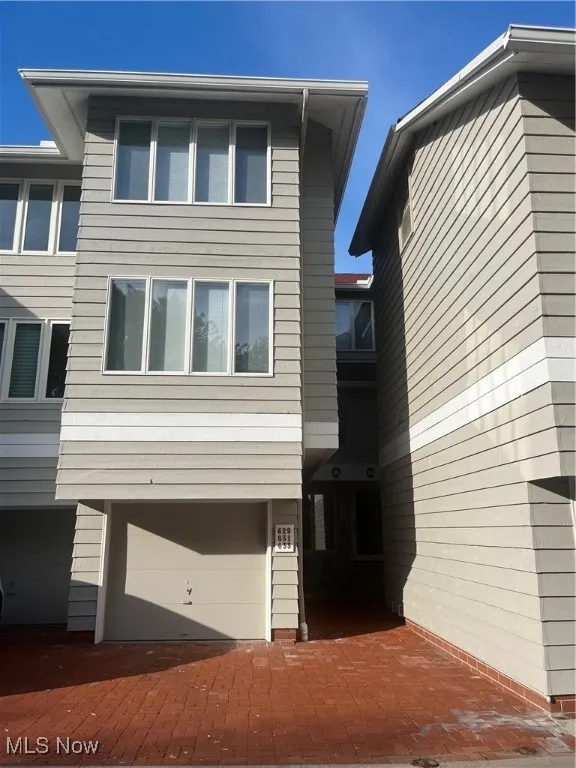 View of front of house with an attached garage