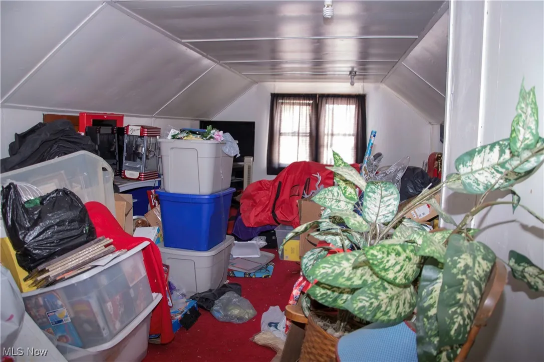 Additional living space with vaulted ceiling.